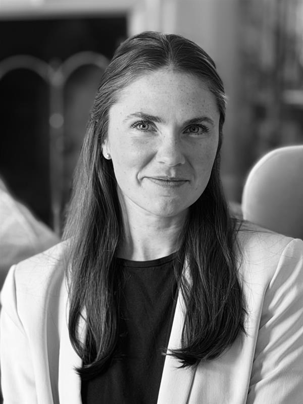 Black-and-white portrait of Madison Guilbeau, attorney at law
